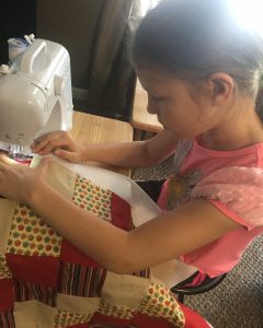Lillianna sewing